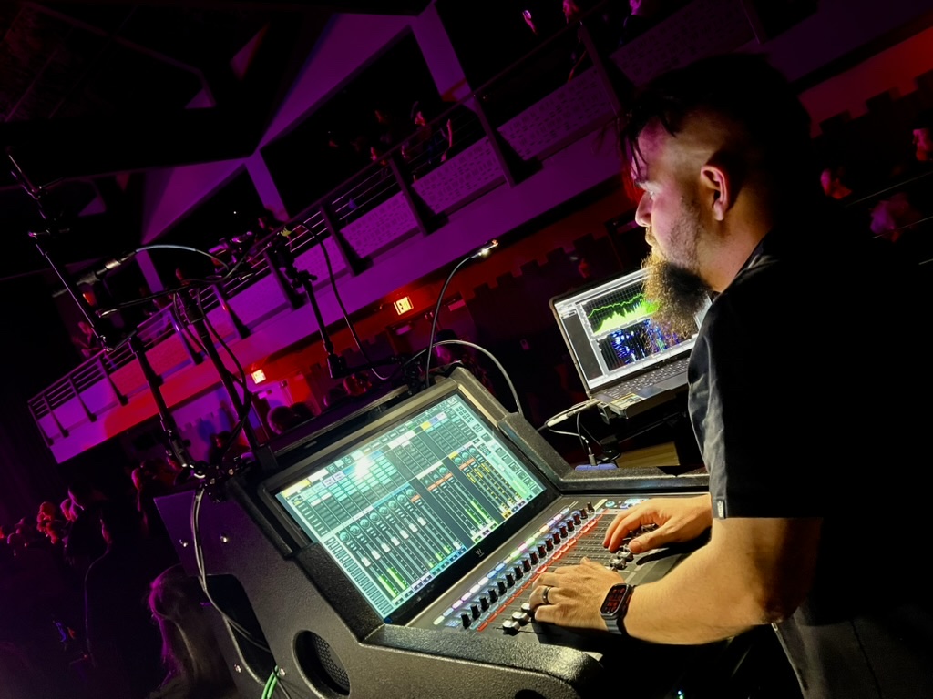 Andrew Peters mixing front of house
